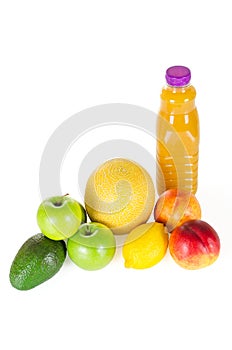 Fresh bottle of juice with fruits isolated on white