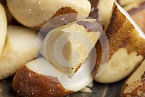 Fresh Brazil nuts peeled from the shell on the table