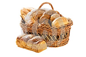 Fresh bread in the basket fully isolated