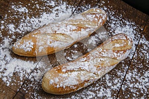 Fresh bread or french baguett and flour