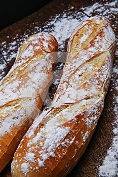 Fresh bread or french baguett and flour