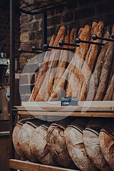 Fresh bread on sale in Le Pain Quotidien bakery-restaurants. Selective focus