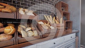 Fresh bread on shelves in bakery 19