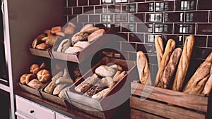 Fresh bread on shelves in bakery 2