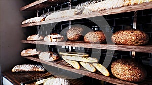 Fresh bread on shelves in bakery 27