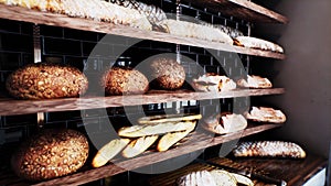 Fresh bread on shelves in bakery 30