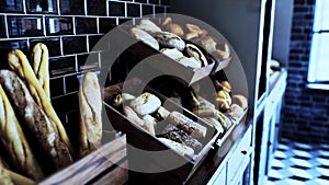 Fresh bread on shelves in bakery 31