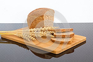 Fresh bread on the wooden board