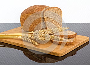 Fresh bread on the wooden board