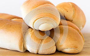 Fresh bread on a wooden table, arranged, shallow depth of field.