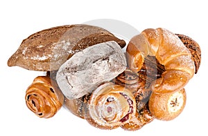 Fresh breads and pastries on white background