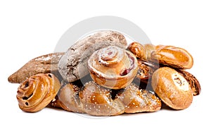 Fresh breads and pastries on white