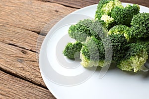 Fresh broccoli cut vegetable in white plate healthy natural clean food