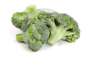 Fresh broccoli isolated on white background close-up. Top view