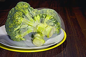 Fresh broccoli on a plate suitable for the preparation of lettuce, soup or sauce.