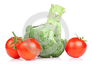 Fresh Broccoli and three red juicy tomato Isolated