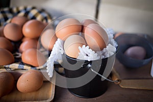 Fresh brown eggs in the basket