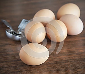 Fresh brown eggs in bowl.