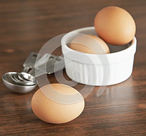 Fresh brown eggs in bowl.