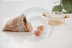 Fresh brown eggs. Chicken eggs in kitchen.
