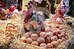 Fresh brown eggs laid on straw