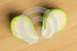 Fresh brussels sprout on light wood