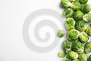 Fresh Brussels sprouts on white background, top view. Space for text
