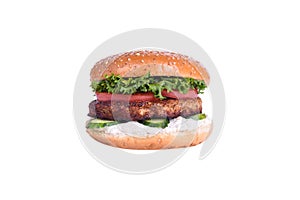 Fresh burger with chicken cutlet, cucumber, tomato, lettuce mix, feta cheese isolated on white background.