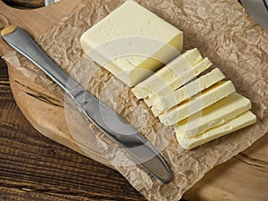 Fresh butter block sliced