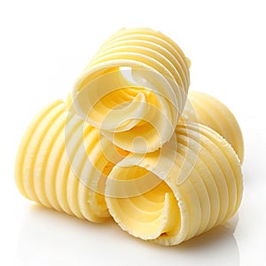 Fresh butter curl isolated on white background