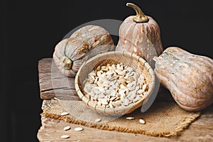 Fresh Butternut Pumpkins on the dark background