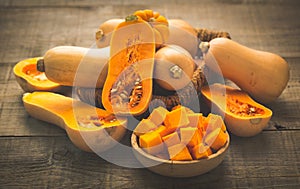 Fresh butternut squash on the wooden table