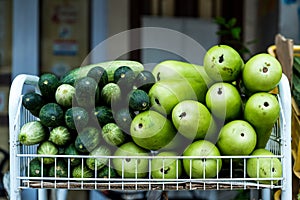 Fresh calabash or bottle gourd and zucchini at grocery store