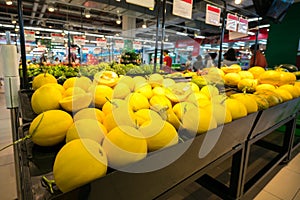 Fresh canary melon on shelf in supermarket.
