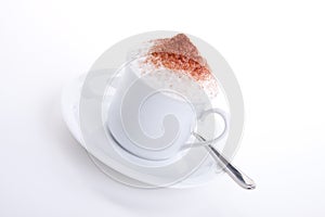 Fresh capuccino with chocolate and milk foam photo