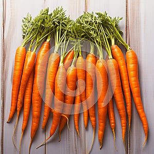 Fresh carrot harvest arranged in an appealing bunch on wooden table