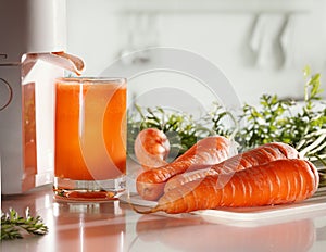 Fresh carrot juice and juicer