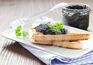 Fresh caviar on toast