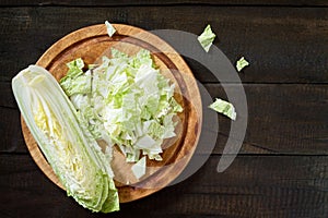 Fresh celery cabbage on a vintage wooden fone. photo