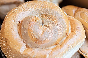 Fresh challah bread for shabbat. Bakery bread roll, bun background.