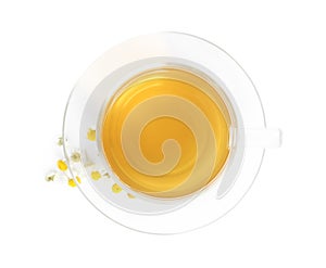 Fresh chamomile tea and dry flowers isolated, top view
