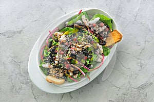 Fresh chard salad, caramelized walnuts, forest fruits. cherry tomato confit and honey