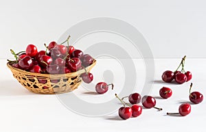 Fresh cherries in a bowl isolated on white backdrop, fruit backround. Healthy food, top view