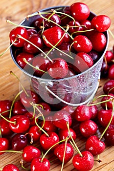 Fresh cherries in a small bucket