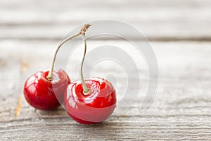 Fresh cherries on wooden background. Red ripe cherry