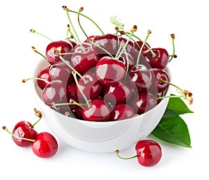 Fresh cherry berries with green leaf