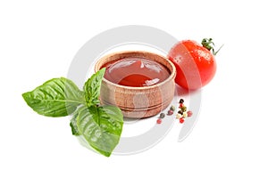 Fresh cherry tomato with basil, souce and spices isolated on white background
