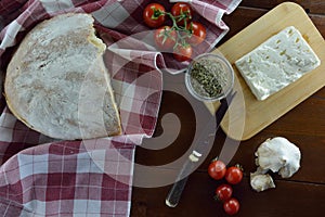 Fresh cherry tomatoes ,feta cheese,olive oil,garlic, thyme and bread