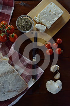 Fresh cherry tomatoes ,feta cheese,olive oil,garlic, thyme and bread