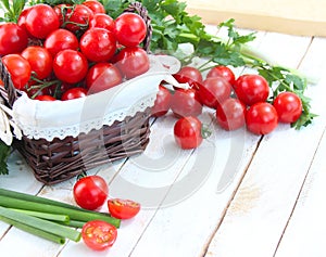 Fresh cherry tomatoes and greens